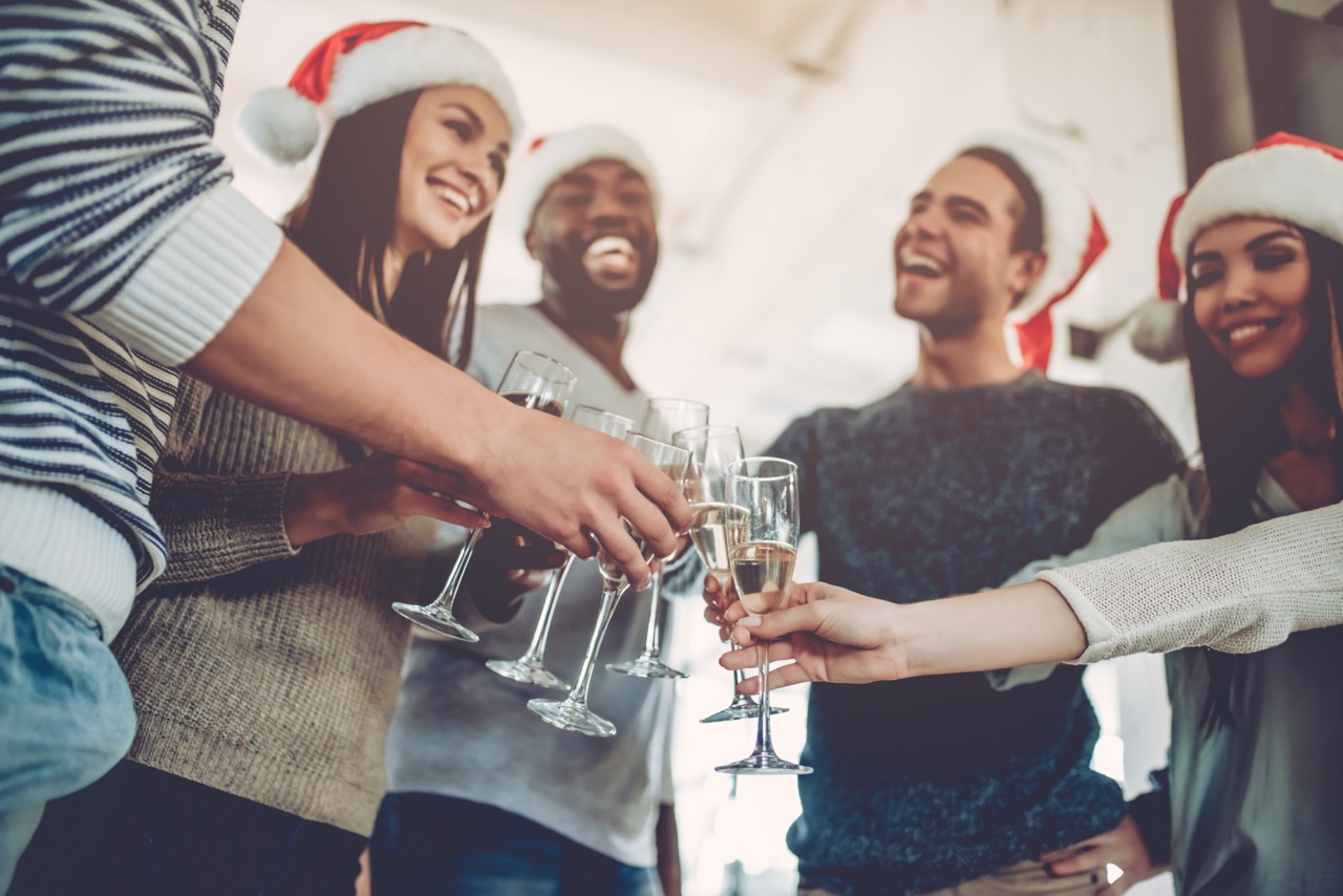 Happy People at holiday party attending Langdon Farms Golf Club event space